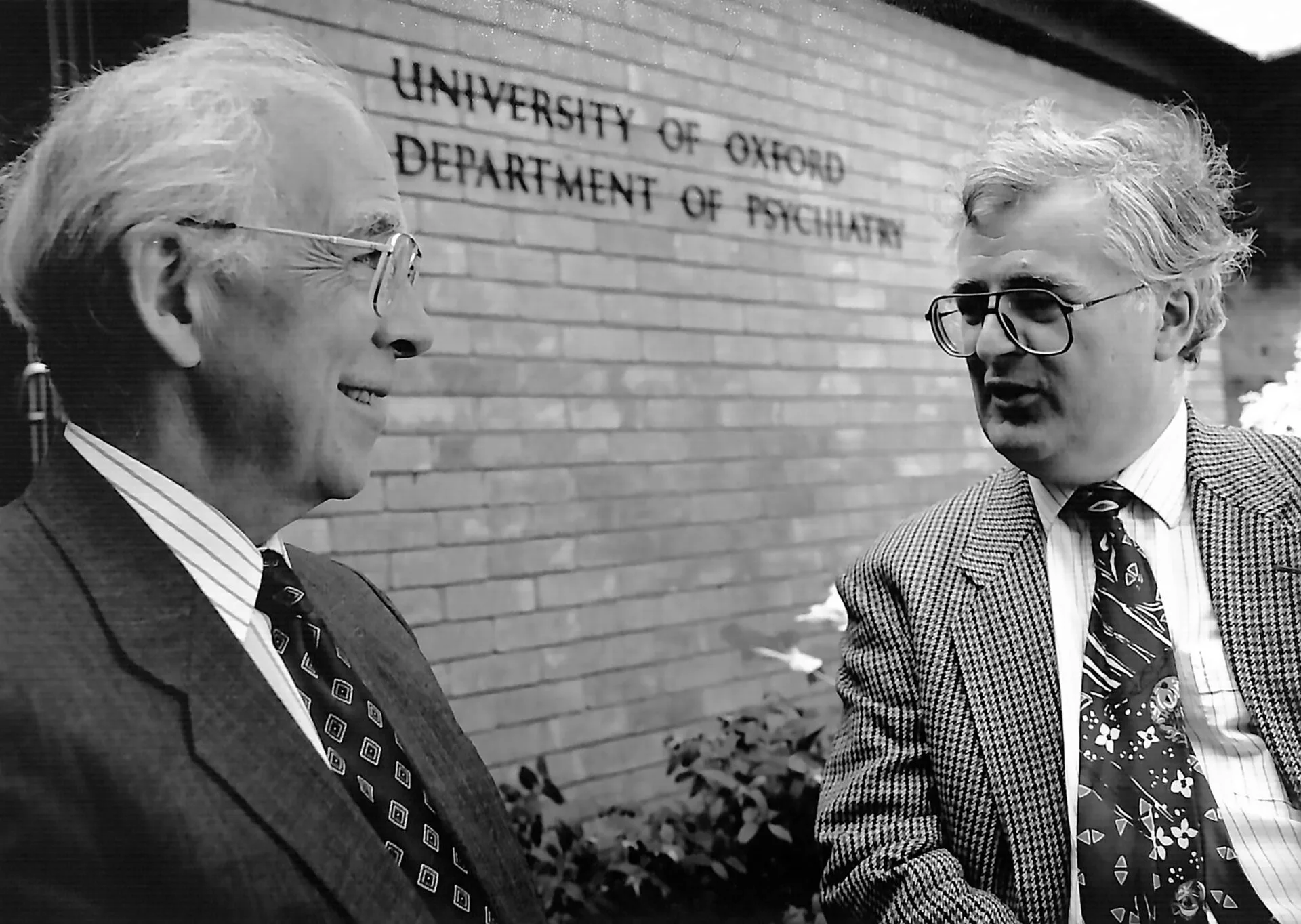 Michael Gelder was appointed the Foundation Chair in Psychiatry at the University of Oxford’s Department of Psychiatry, based at the Warneford, in 1969. Gelder is pictured here outside the department with John Hall, the Warneford’s Lead Clinical Psychologist, in the 1980s. (Image 1 of 2)