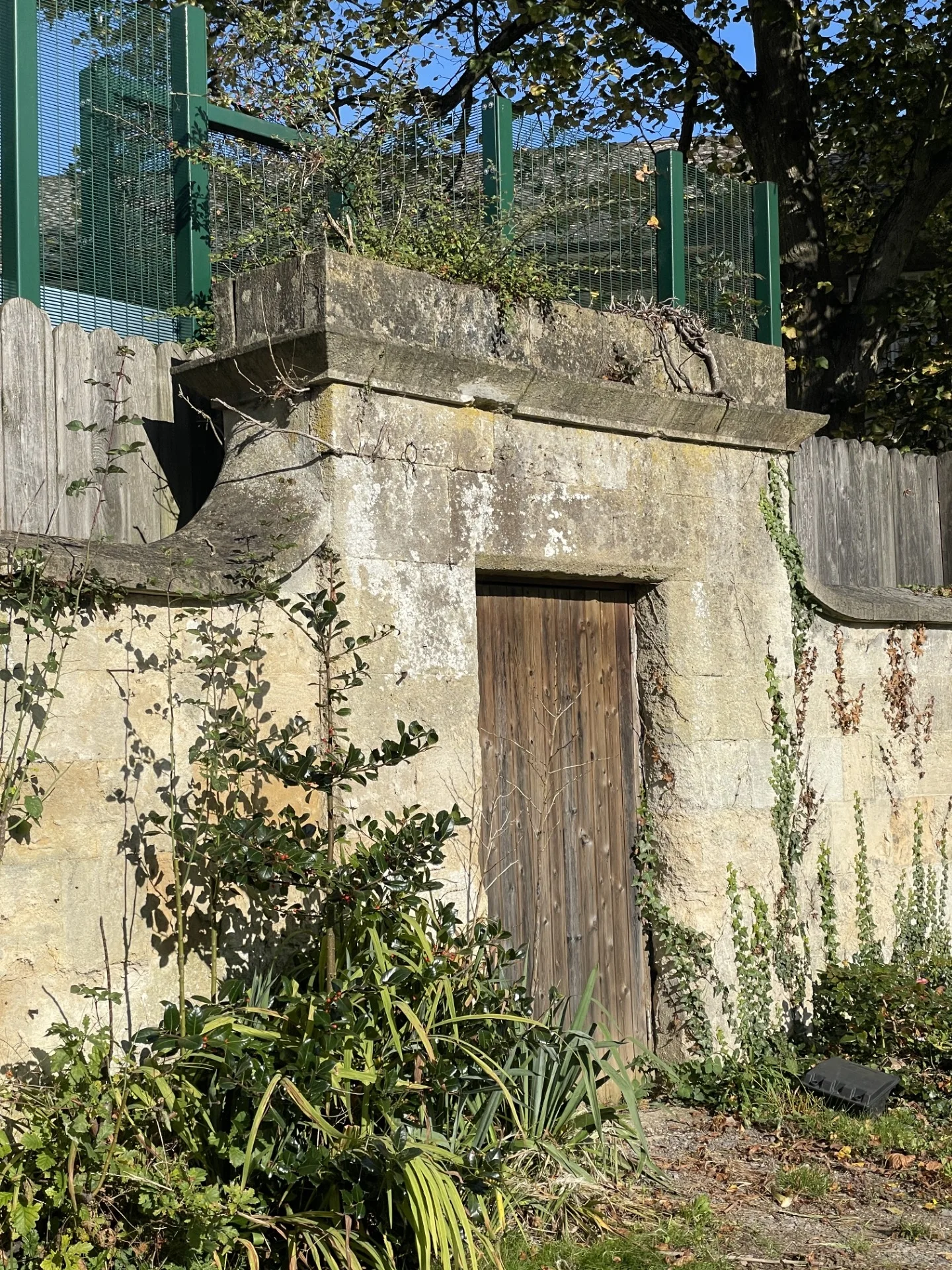 If you face the former entrance to the hospital, on your left you can see the old Airing Court walls, with the door to the rest of the grounds, indicated on the plan below. Credit: Donald Insall Associates