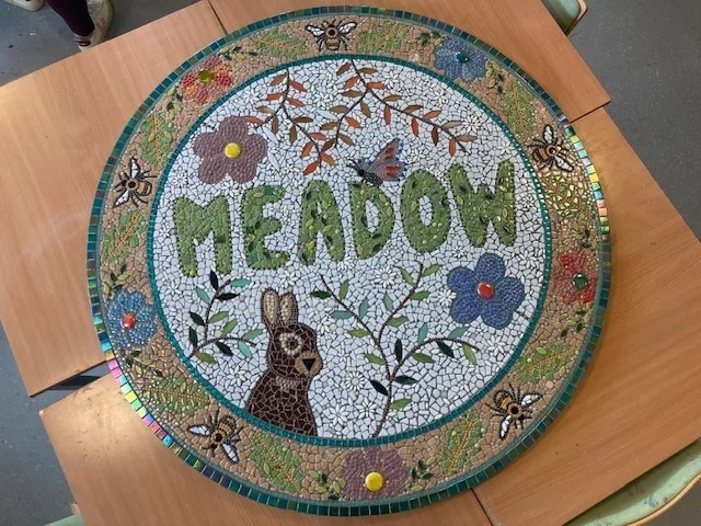 The Meadow Unit for children opened in 2023. Service-users helped to create the mosaic sign on the outside of the building. Credit: Tom Cox