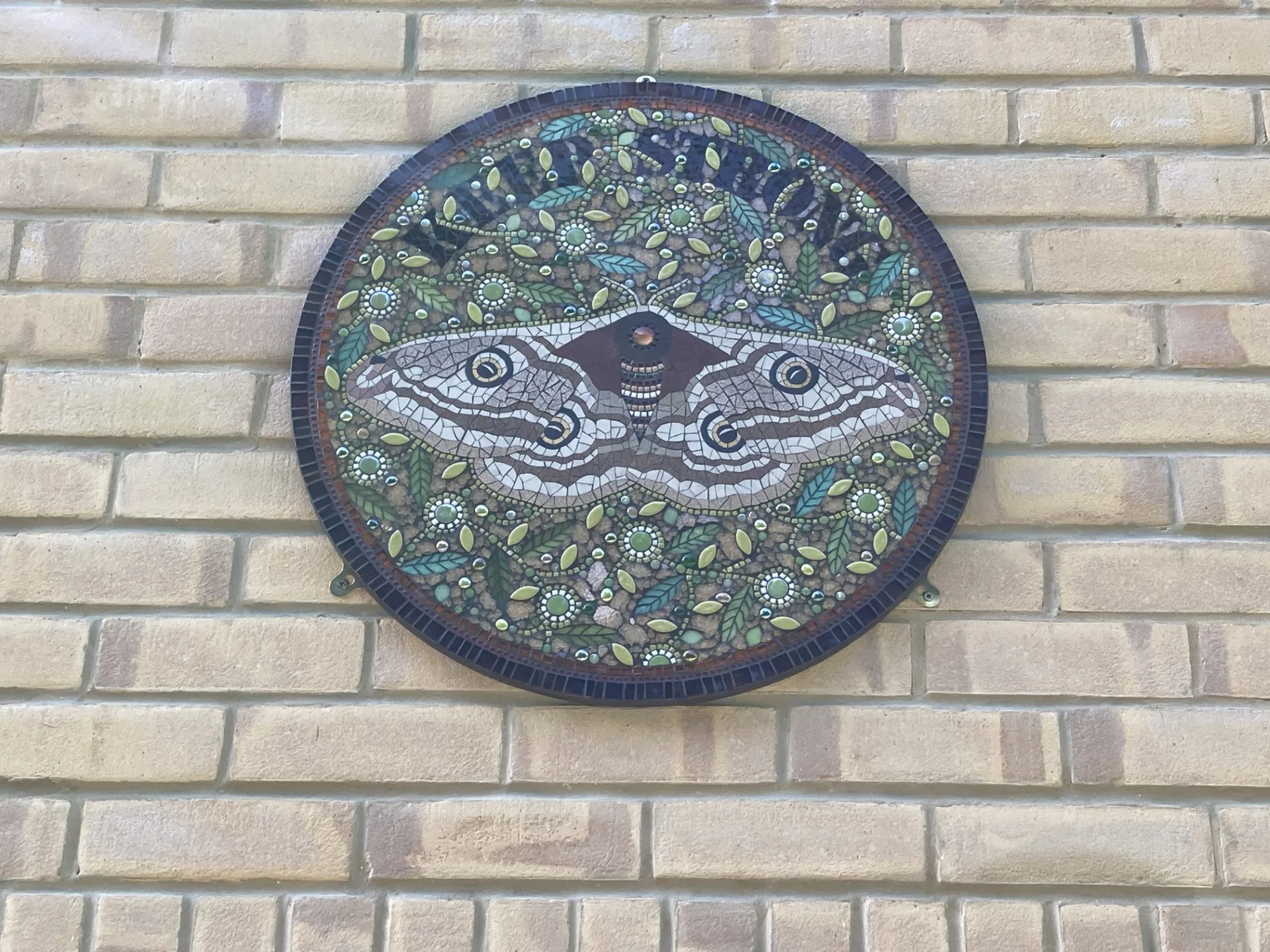 These mosaic plaques were designed with input from service-users who also chose the wording.
Credit: Tom Cox