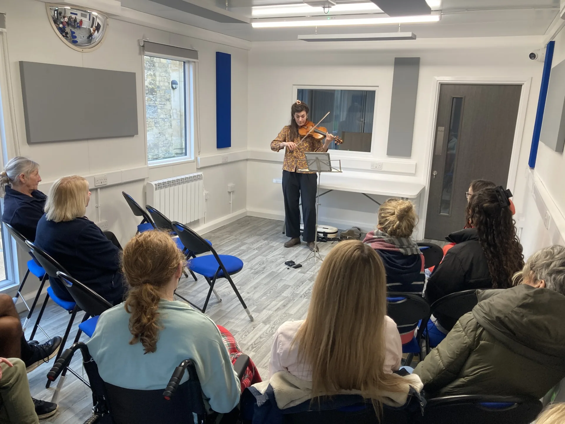 Service users enjoying music inside Lucy’s Room. Credit: Tom Cox