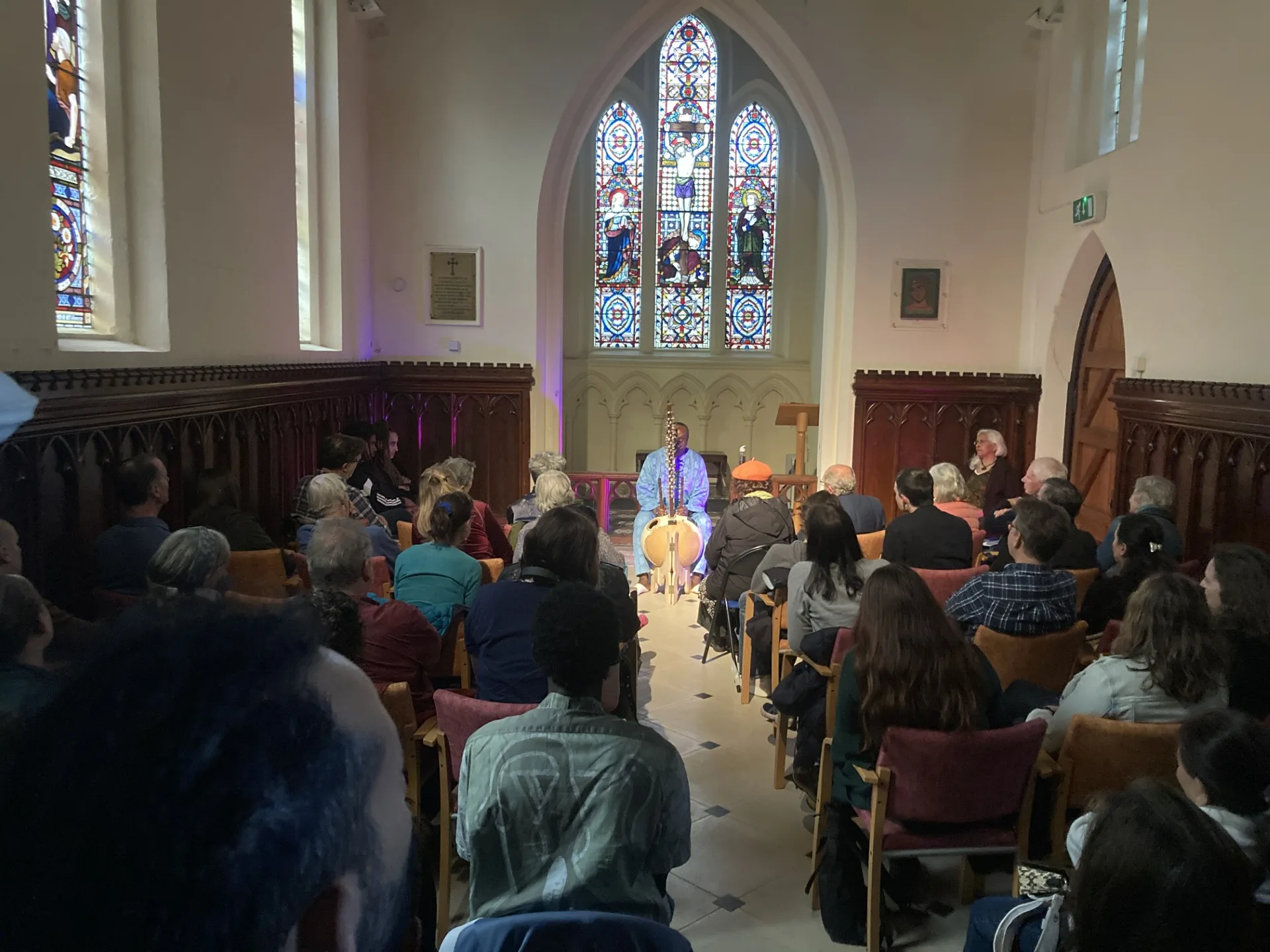 Inside the Sanctuary (the former Chapel) in the 2020s; here you can see the glorious stained-glass windows. Credit: Tom Cox